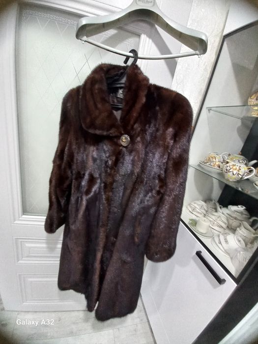 Верхняя одежда женская.