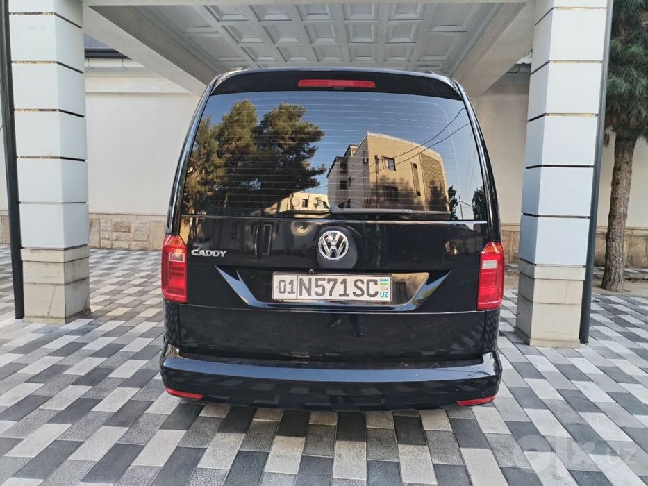 Volkswagen Caddy qora rang