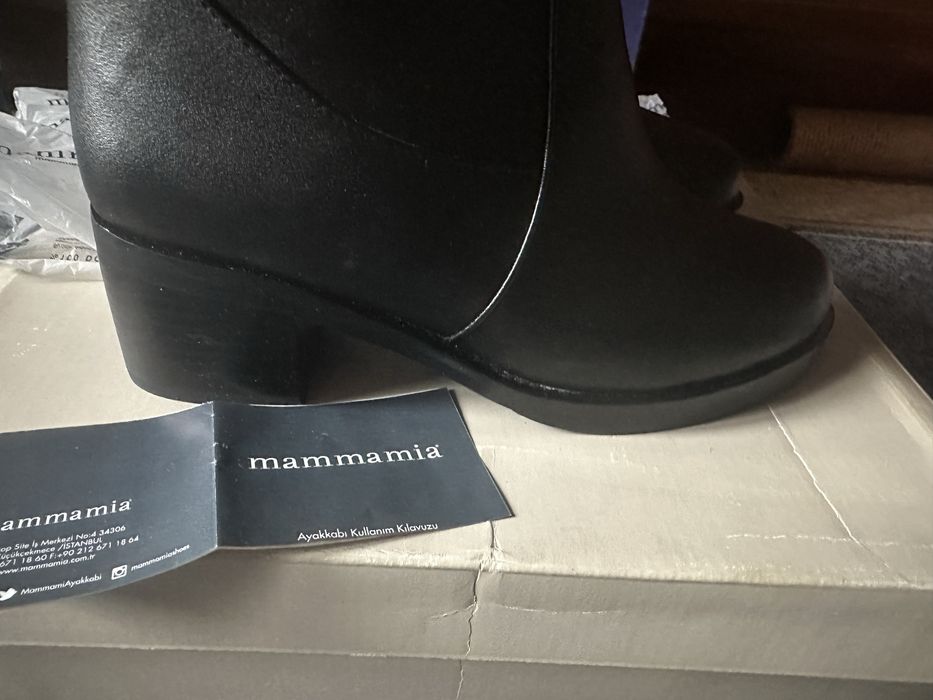 Продам новые женские сапоги