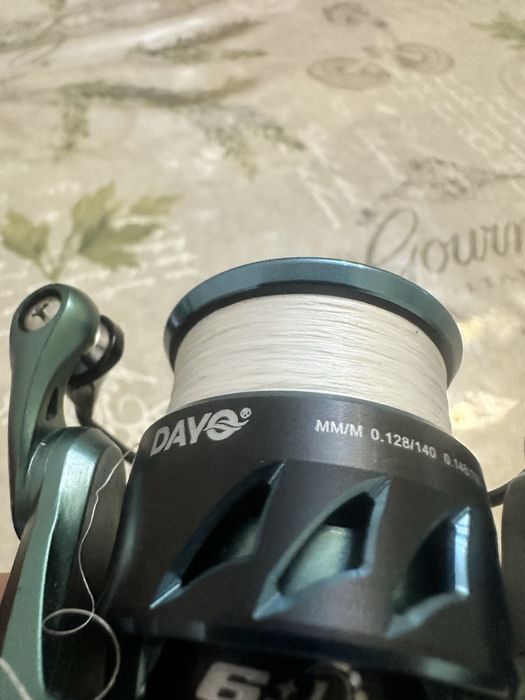 продам катушку dayo prestige 800