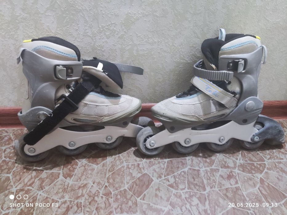 Роликовые коньки