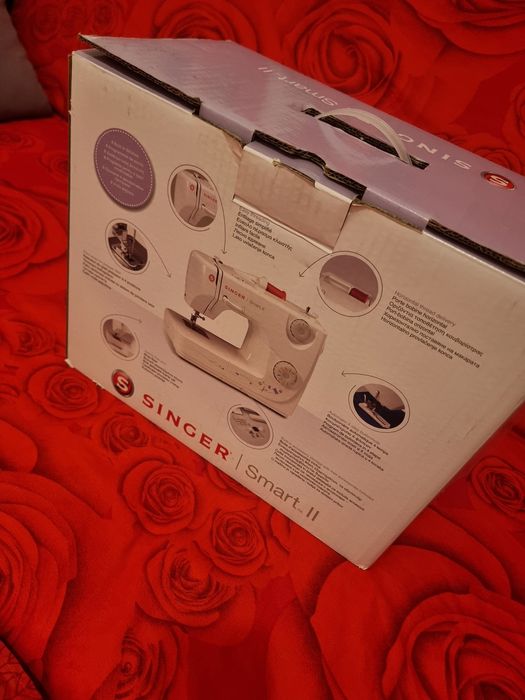 Se vinde masina de cusut Singer Smart II