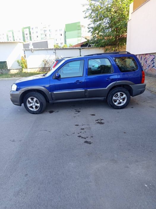Кола Mazda Tribute