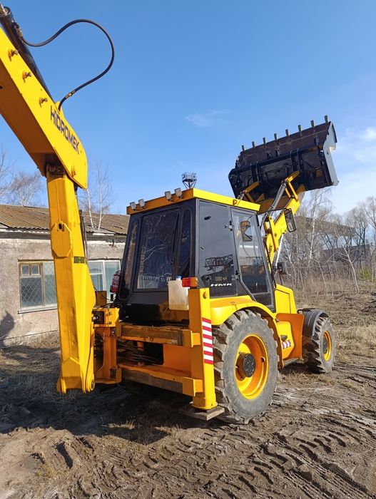 Продам экскаватор погрузчик