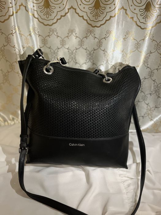 Geanta de umar kevin clain