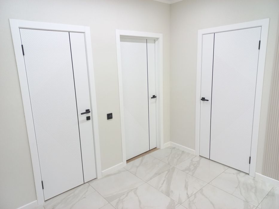 Установка межкомнатных дверей, замки.