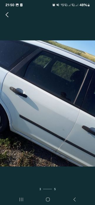 Vand usi complecte albe  fata spate dreapta ford focus 2 an 2007