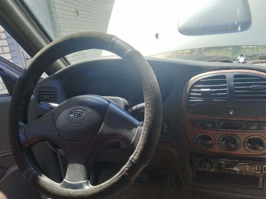 Автомобиль KIA Sportage