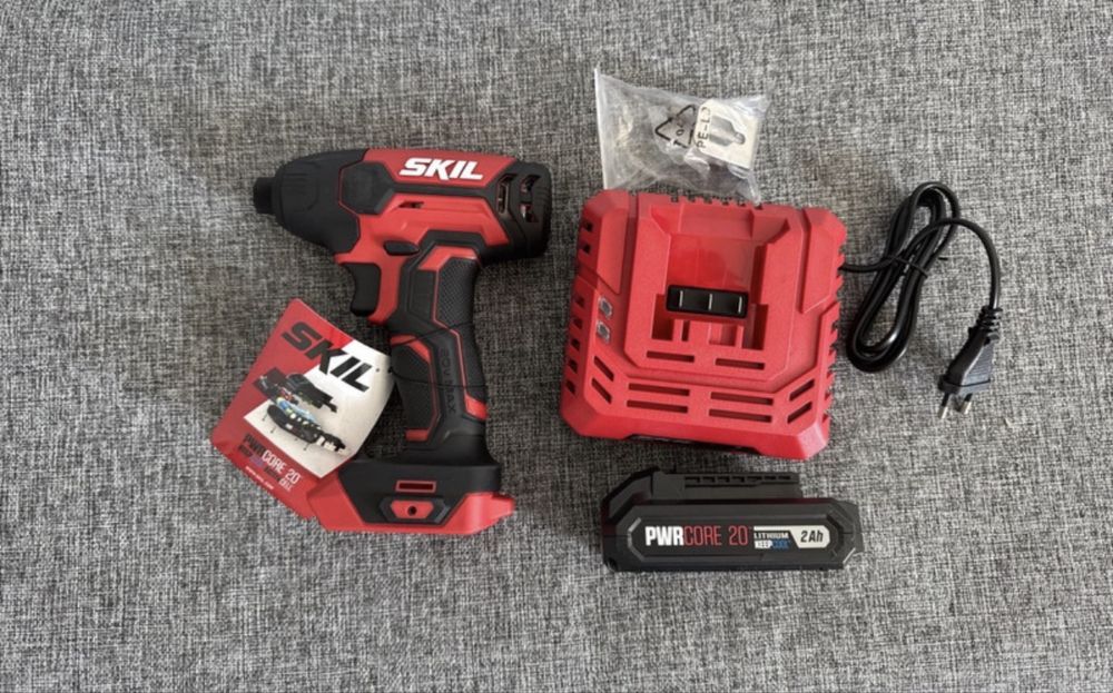 Masina de insurubat cu impact Skil cu acumulator&incarcator 20 V, 2 Ah