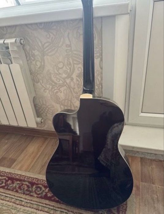 Гитара чехолымен царапина нету