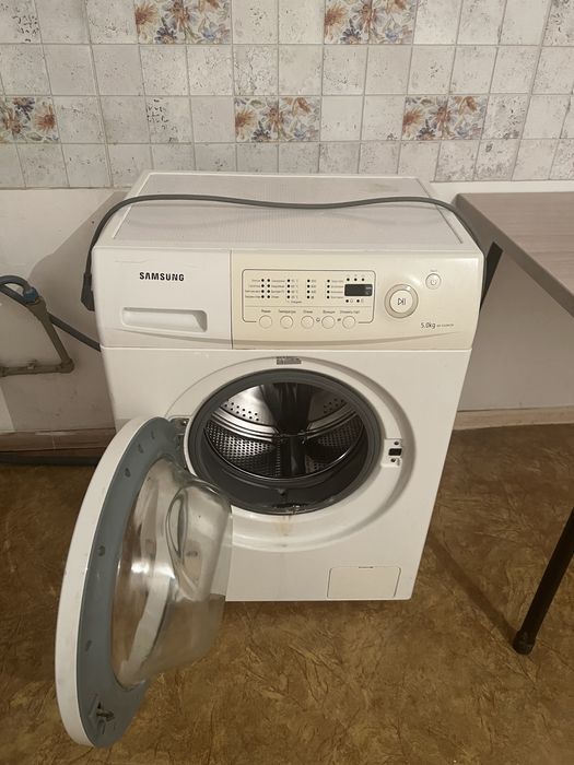 Продам стилаьную машину 5 кг