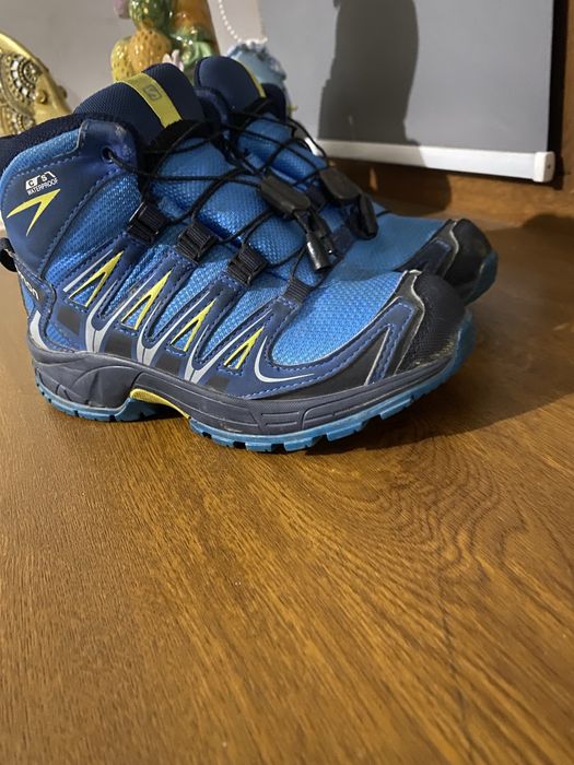 Сапоги бренда Salamon