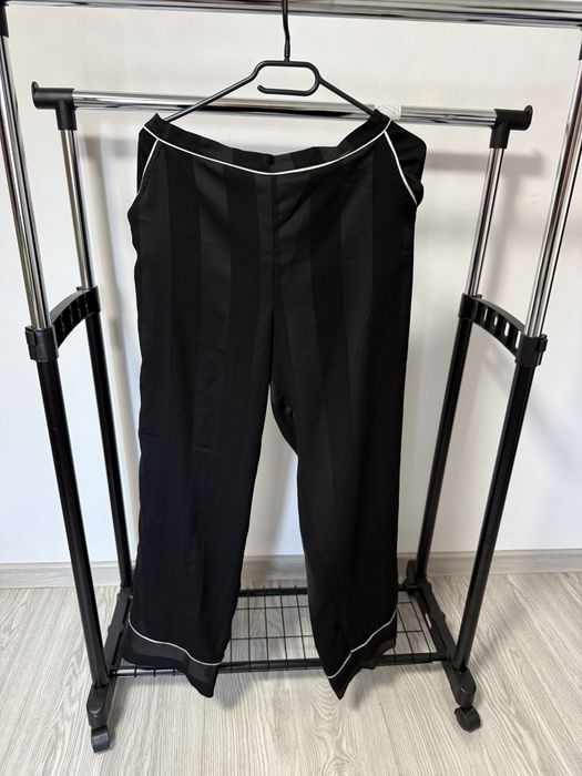 Pantaloni Femei.