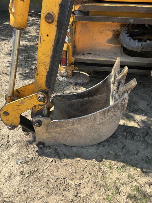 Cupa 45 caterpillar schimb cu jcb