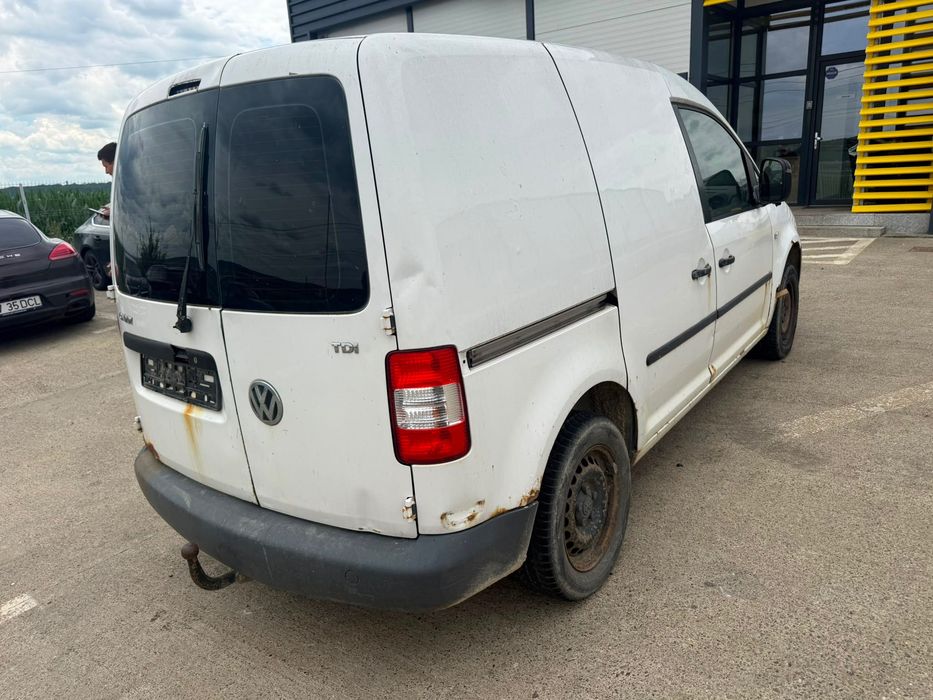 Dezmembrez Vw caddy 2008 alba 1.9 tdi BLS volan stanga cutie JCS