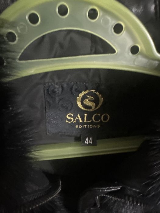 Кожаный пуховик с норкой