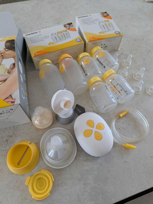 Помпа за кърма Medela и комплект шишета и биберони