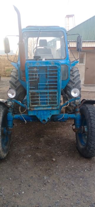 Продам трактор с телегами и плуг