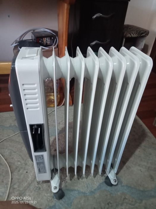 Масляный радиатор типа электронный печь