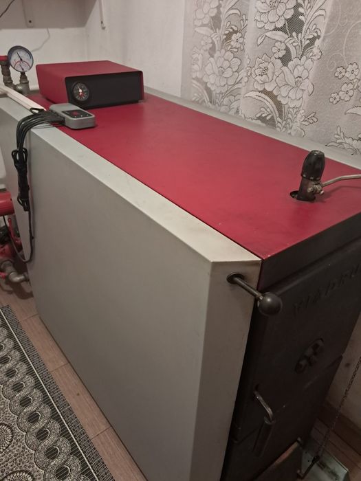 Vând centrala termica pe combustibil solid lemn cărbune marca viadrus