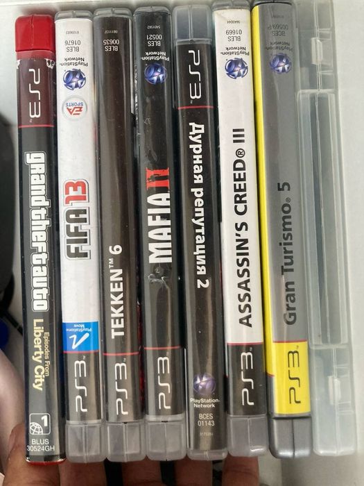 Продам PS3 Slim с играми и 2 джойстиками