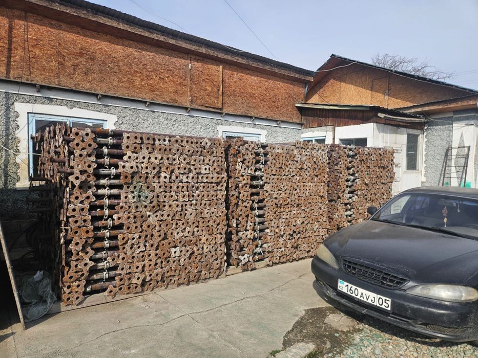 Домкрат струбцина телескопическая стойка