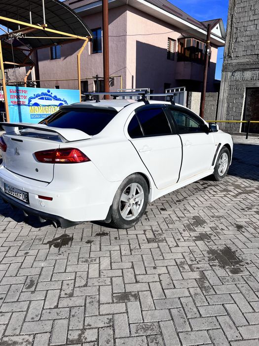 Продам машину lancer 10 2.0