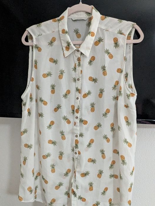 Cămașa fără mâneci dama