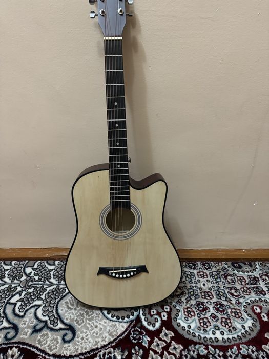 Янги гитара сотилади