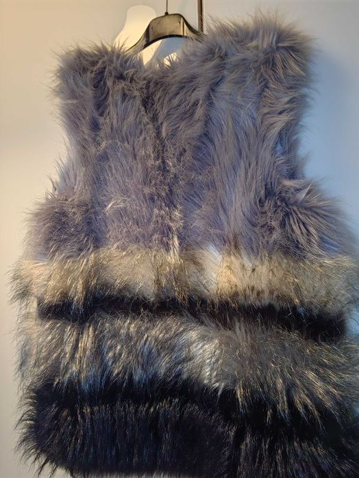 Дамски пухен елек