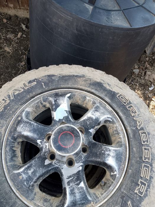 Vând genti de aliaj cu cauciucuri Opel frontera