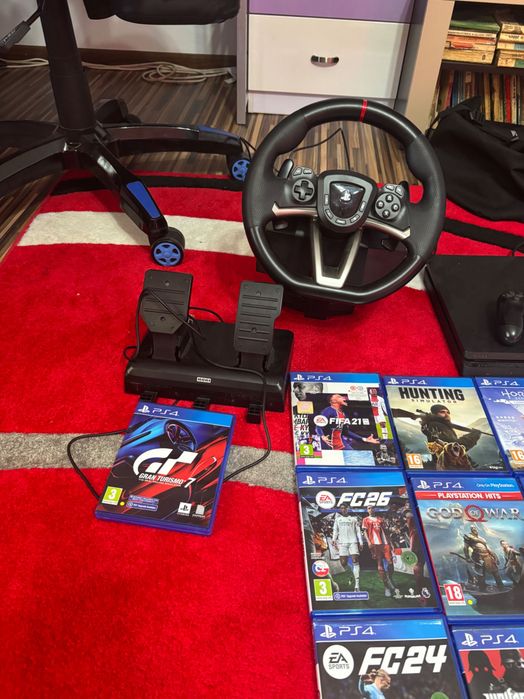 PS4 cu 20 de jocuri și volan.
