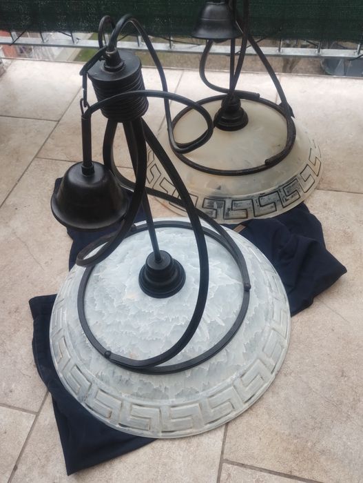 O pereche de candelabre  fier forjat