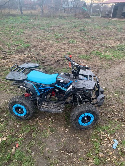 Vând atv copii aproape nou