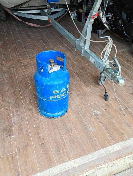 Vând butelie albastră cu guler