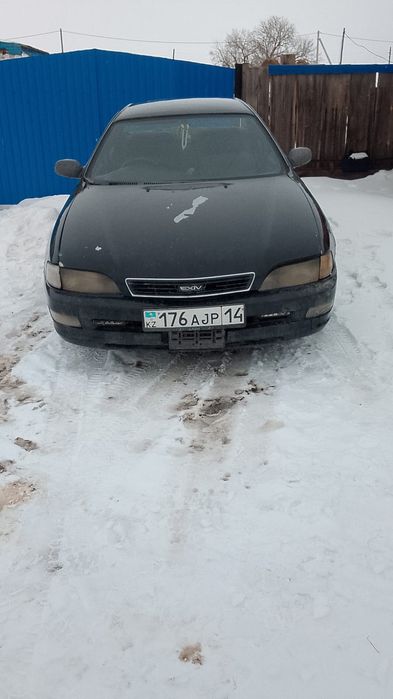 Таёта Карона Exiv