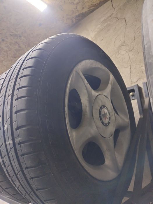 Продам диски литые с резиной Ауди