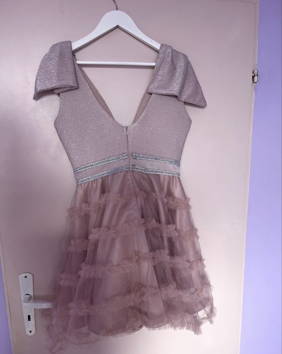 Бутикова рокля.