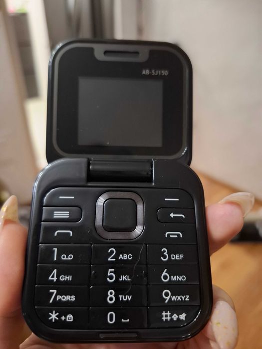 Мини мобилен телефон