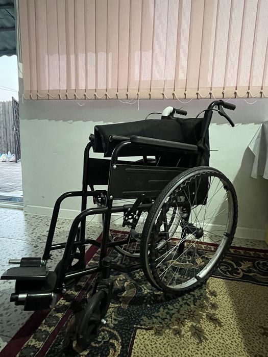 Коляка инвалидная