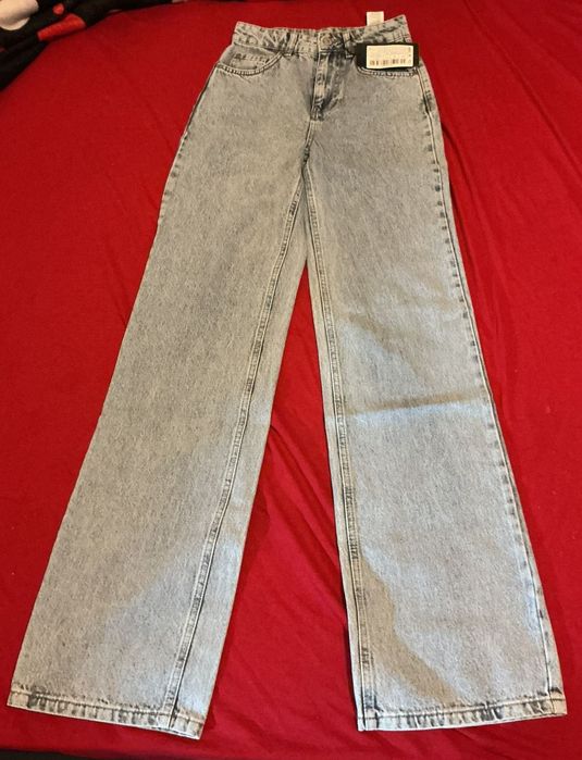 Blugi dama evazați cu talie imalta