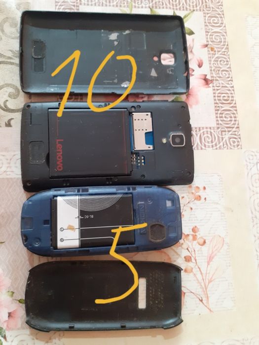 Телефони за части