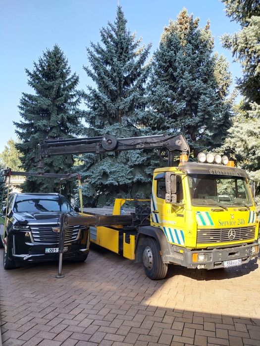 Манипулятор услуги эвакуатор сиежающий платформе