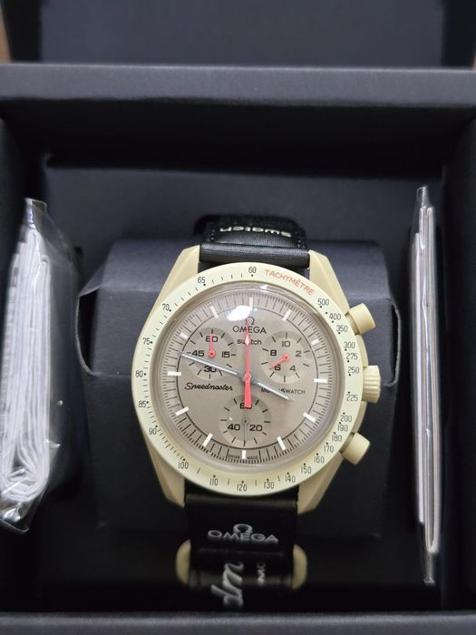 Swatch omega mission to люкс