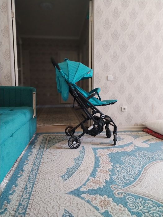 Детская коляска бирюзовый цвет