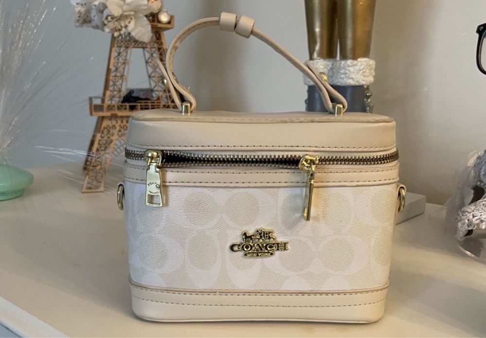 Маленькая сумка коач