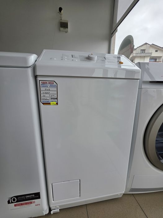 Пералня с горно зареждане Míele