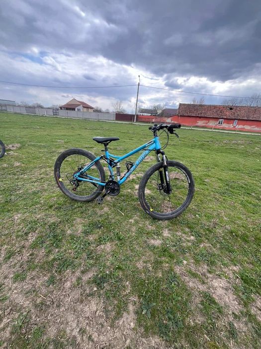 Bicicleta full suspensie
