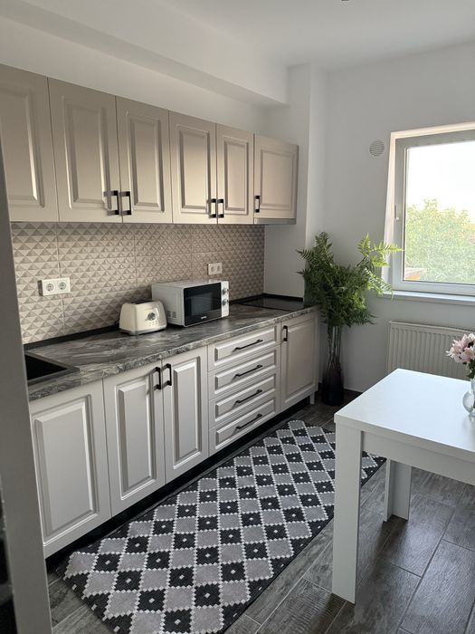 Inchiriez apartament o camera nou , alfa , arad !