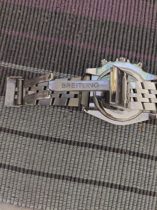 2 ceasuri barbatesti , unul Breitling si altul Slazenger